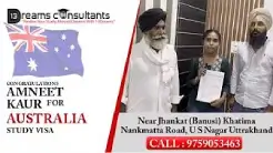 Amneet Kaur proudly displaying her approved Australia study visa with the team at 13 Dreams Consultants, Khatima, Uttarakhand